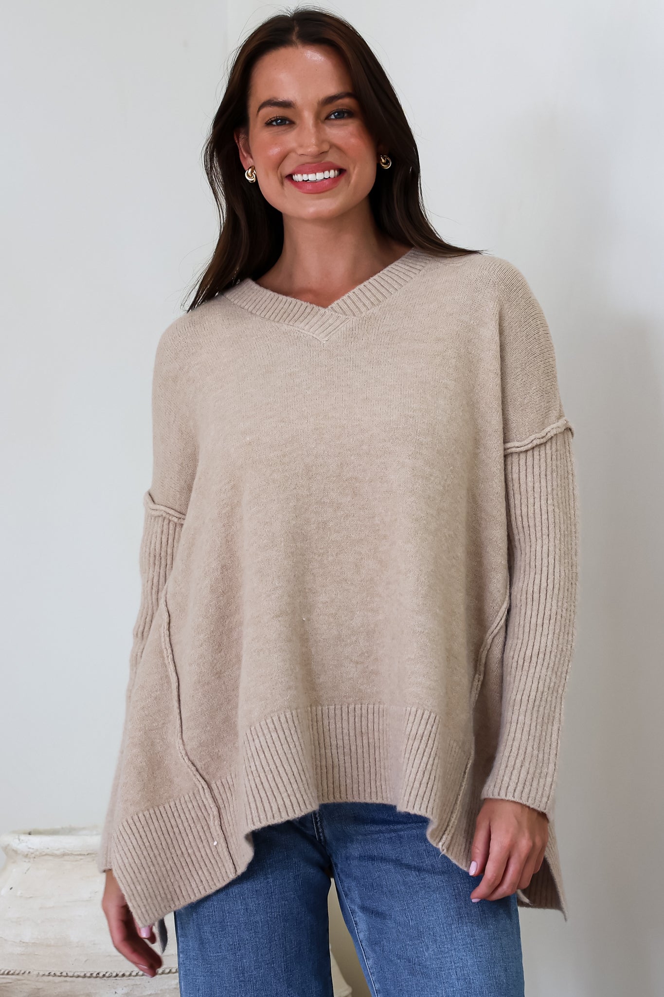 Ridge Jumper - V Neck Relaxed Shark Bite Ribbed Hemline Knit in Beige