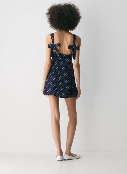 Fit-and-flare micro dress with polka dot pattern